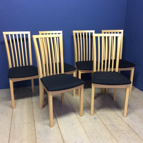 509 - A set of 6 modern light coloured chairs with black seats