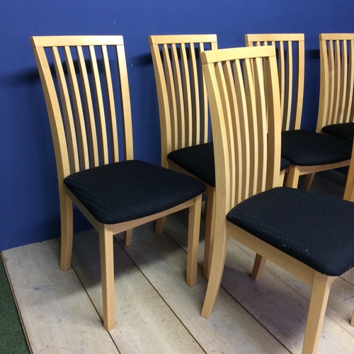 509 - A set of 6 modern light coloured chairs with black seats