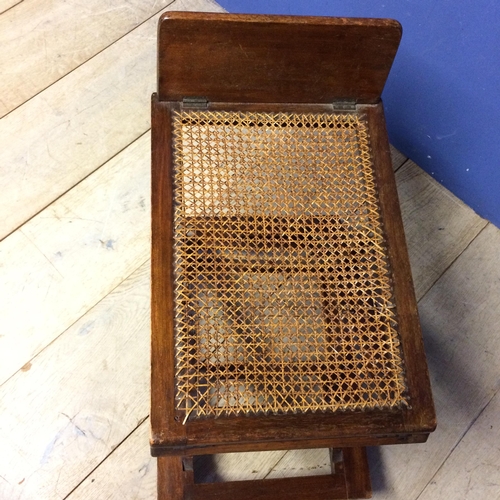 517 - Edwardian mahogany metamorphic stool with bergère to top (some areas of caning in need of repair)