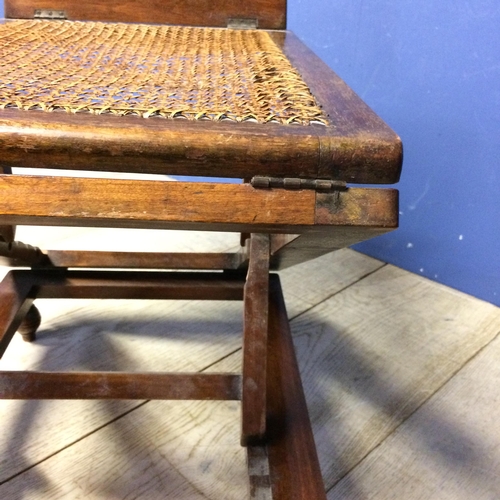 517 - Edwardian mahogany metamorphic stool with bergère to top (some areas of caning in need of repair)