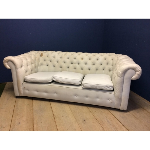 518 - Victorian chesterfield sofa, upholstered in a light coloured fabric (some areas grubby with marks, i... 