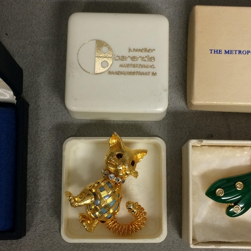 52 - Pair of Tiffany style white metal and synthetic pearl set earrings, and a yellow metal cat brooch, a... 