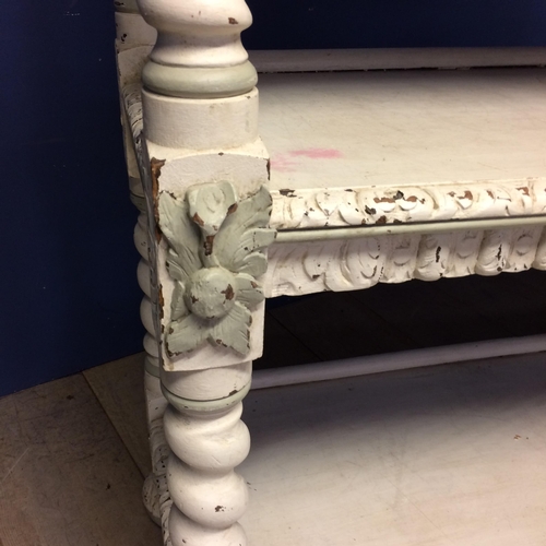 521 - Decorative shabby chic, grey painted buffet of 3 shelves, with ornately carved back finial, raised o... 