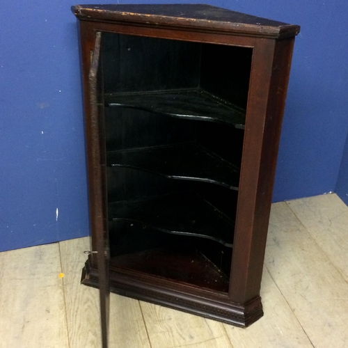 524 - Small dark oak hanging corner cupboard with brass hinges and with key 96h x 67 w x 33 d cm