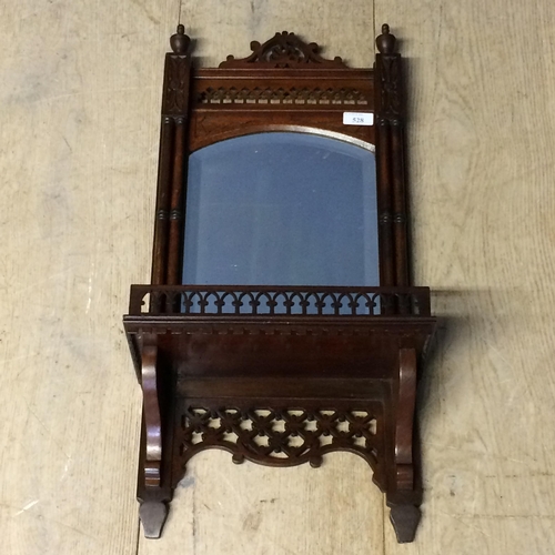 528 - Mahogany hanging wall mirror and shelf, with ornately carved fretwork design and finials