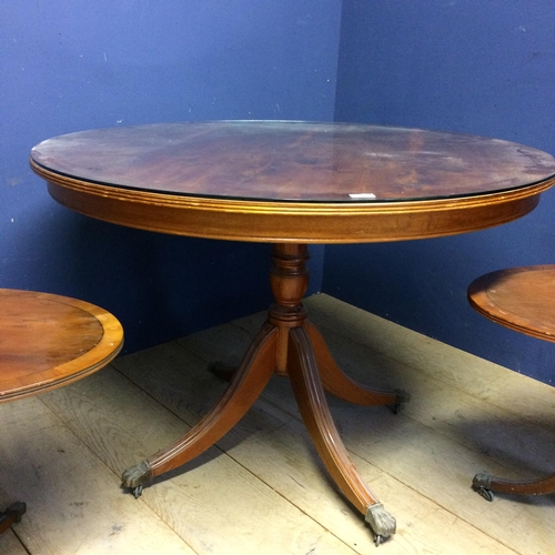 529 - Circular snap top pedestal table, with glass top, and 2 smaller oval tables 108w x 77h cm