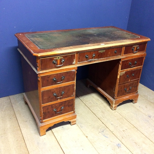 530 - 9 drawer bureau, with green leather top, in need of  attention, much wear 77h x 123w x 62d cm