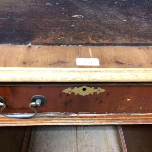 530 - 9 drawer bureau, with green leather top, in need of  attention, much wear 77h x 123w x 62d cm