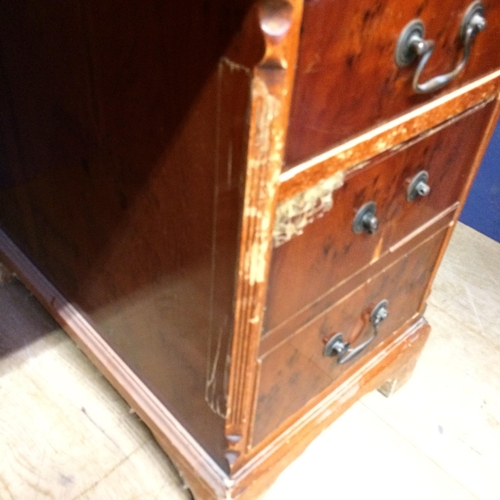 530 - 9 drawer bureau, with green leather top, in need of  attention, much wear 77h x 123w x 62d cm