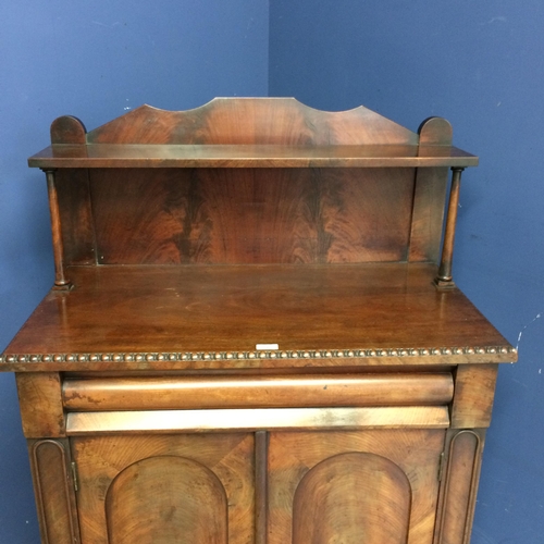 547 - Mahogany buffet, with a shelf above a two door cupboard opening to reveal shelf 129h x 84w x 46d cm