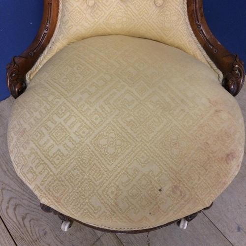 548 - Victorian yellow upholstered button back chair with cabriole legs to China castors