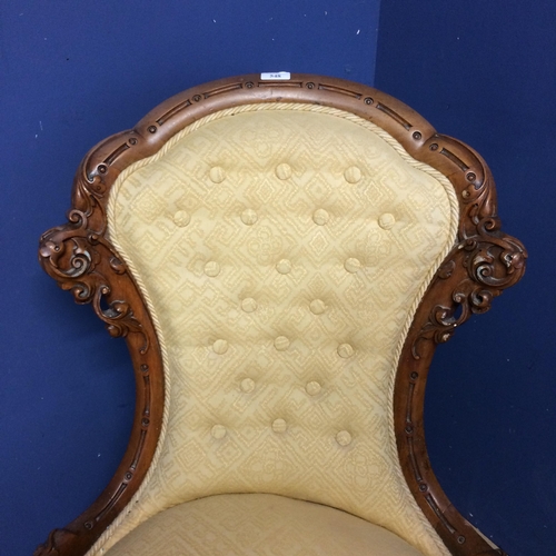 548 - Victorian yellow upholstered button back chair with cabriole legs to China castors