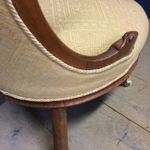 548 - Victorian yellow upholstered button back chair with cabriole legs to China castors