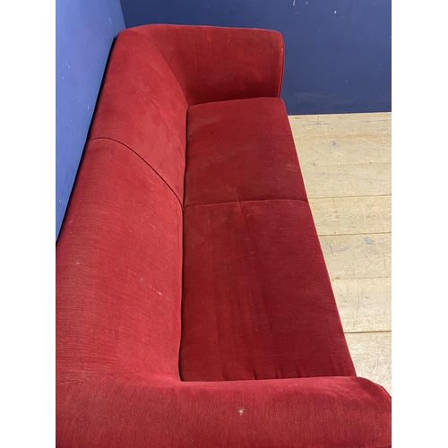 561 - Contemporary red sofa (in used condition) 177cm W x 82cm d