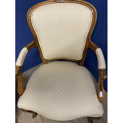 563 - Pair of French show frame style chairs, with cabriole legs, upholstered in a cream fabric, makers la... 