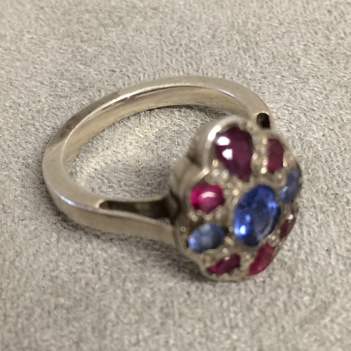 57 - 18ct white gold ruby & sapphire set flower ring in the manner of Sibyl Dunlop, 5.6g size N ( not hal... 