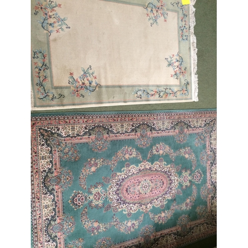 580 - Rugs: Chinese wash style rug with blue ground and pink and oakmeal boarders, and pink central medall... 