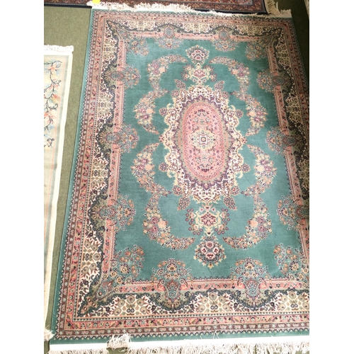 580 - Rugs: Chinese wash style rug with blue ground and pink and oakmeal boarders, and pink central medall... 