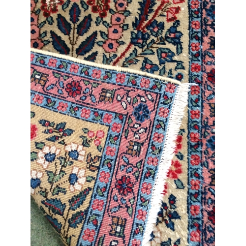 583 - 4 rugs, 3 red ground rugs with all over geometric stylized designs, and a blue and red ground Tree o... 