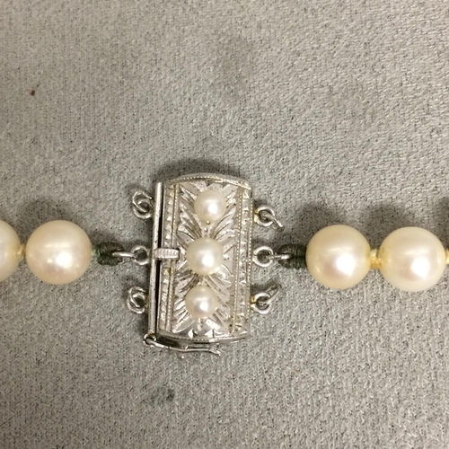 6 - Strand of uniform cultured pearls, and a triple strand of uniform cultured pearls, together with a s... 