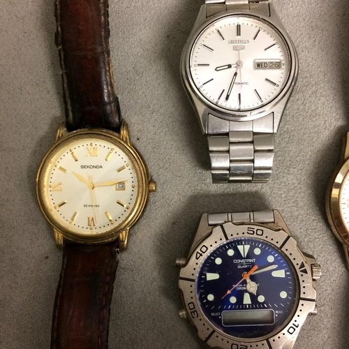 65 - A collection of vintage wristwatches to include a Sekonda 25 Jewel Automatic with dat date aperture