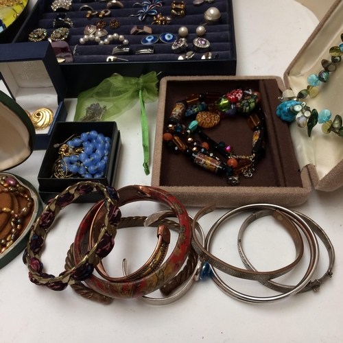 67 - A large and interesting selection of costume, vintage and silver jewellery, to include Jet beads, tu... 