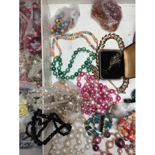 67 - A large and interesting selection of costume, vintage and silver jewellery, to include Jet beads, tu... 