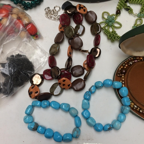 67 - A large and interesting selection of costume, vintage and silver jewellery, to include Jet beads, tu... 