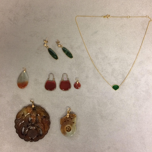 70 - Collection of Jade and hardstone items, to include a pair of Spinach jade earrings, a pierced and ca... 