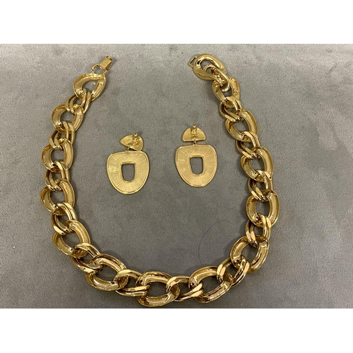 71 - Gilt metal 1970s suite of jewellery by Napier to include oval link heavy chain necklace, and a pair ... 