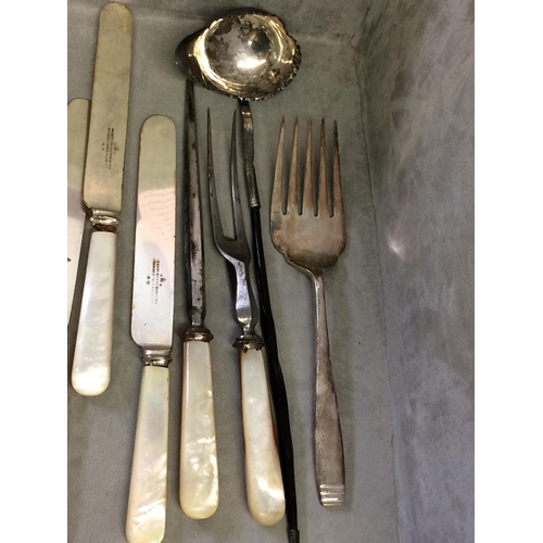 77 - A large quantity of flatware, including bone handled knives and forks etc and knife rests