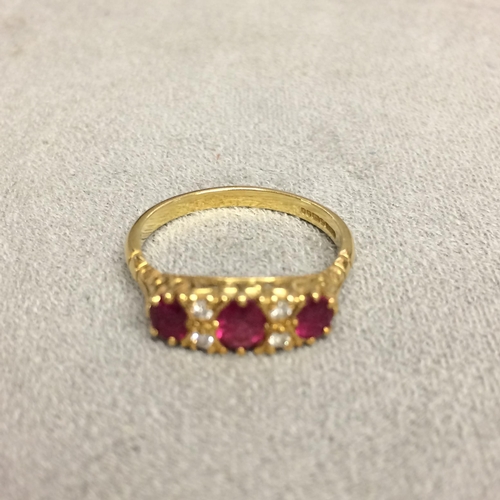 83 - 18ct old 3 stone ruby ring with single cut diamond acc 3.3g size N