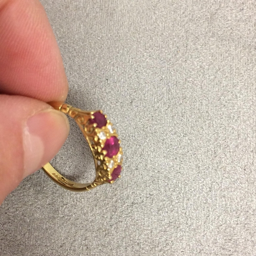 83 - 18ct old 3 stone ruby ring with single cut diamond acc 3.3g size N