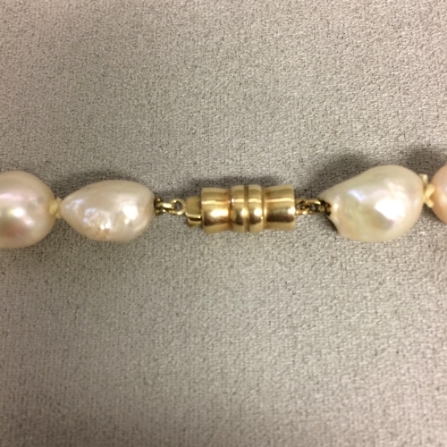 9 - Baroque Pearl and lapis necklace strand on a 14ct gold clasp, 40cm