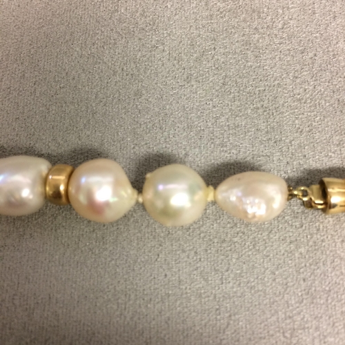 9 - Baroque Pearl and lapis necklace strand on a 14ct gold clasp, 40cm