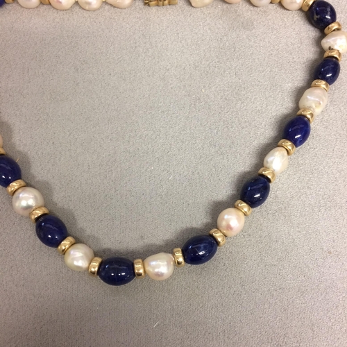 9 - Baroque Pearl and lapis necklace strand on a 14ct gold clasp, 40cm