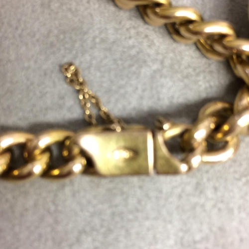 90 - 15ct gold flat curb link charm bracelet with spade guinea, 2 gilt metal watch fobs, 9 ct cross and 2... 