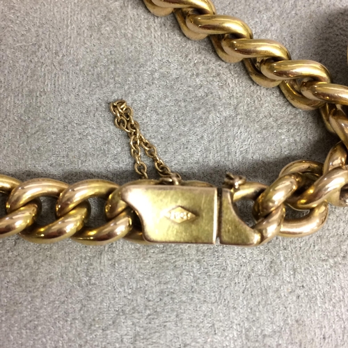 90 - 15ct gold flat curb link charm bracelet with spade guinea, 2 gilt metal watch fobs, 9 ct cross and 2... 