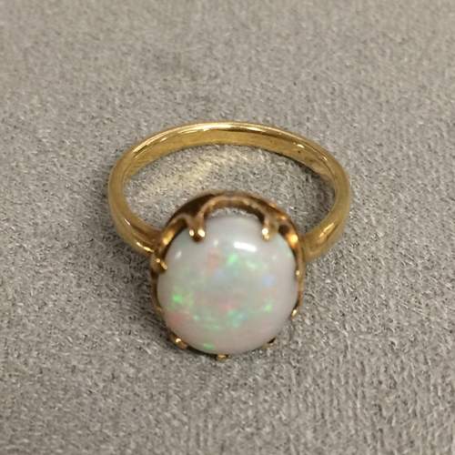 91 - Unmarked yellow metal and Australian opal dress ring 2.8g size I