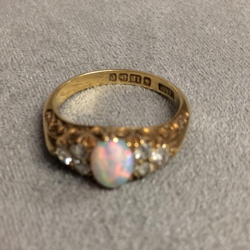 92 - 18ct gold opal and old cut diamond ring central oval cabochon opal with single cut diamond accents, ... 