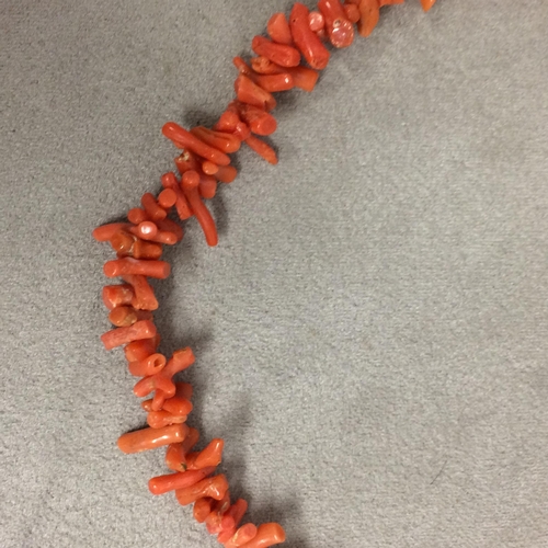 96 - A dogs tooth red Coral necklace