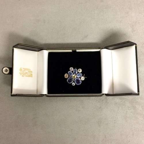 97 - Unmarked white metal sapphire and fancy sapphire  brooch 9.7g (some inclusions to one of the big blu... 