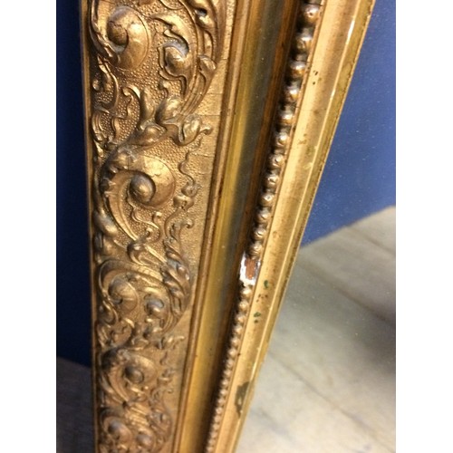 240 - Rectangular carved gilt wood wall mirror with Gesso pediment (C20th mirror and old gesso), 125 x 70c... 