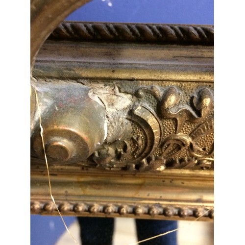 240 - Rectangular carved gilt wood wall mirror with Gesso pediment (C20th mirror and old gesso), 125 x 70c... 