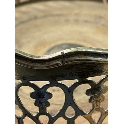 114 - A silver plate wine bottle coaster with pierced gallery and turned wooden base, gross 69ozt  see ima... 