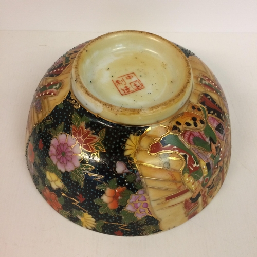 447 - A Oriental C20th bowl, with raised decoration, 20/5cm diam x 10cm high