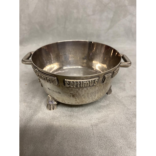 1 - An Arts and Crafts Sterling silver twin handled bowl with planished finish and applied cast inscript... 