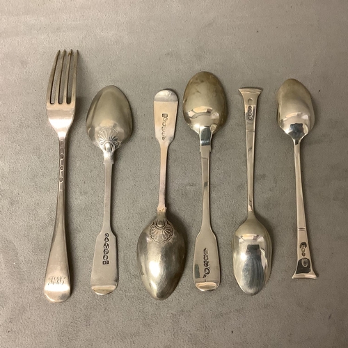 103 - A mixed collection of sterling silver flatware to include a pair of grapefruit spoons by Alexander C... 