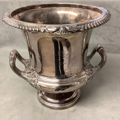 109 - A silver plated campagna style champagne ice bucket, together with a pair of plated 