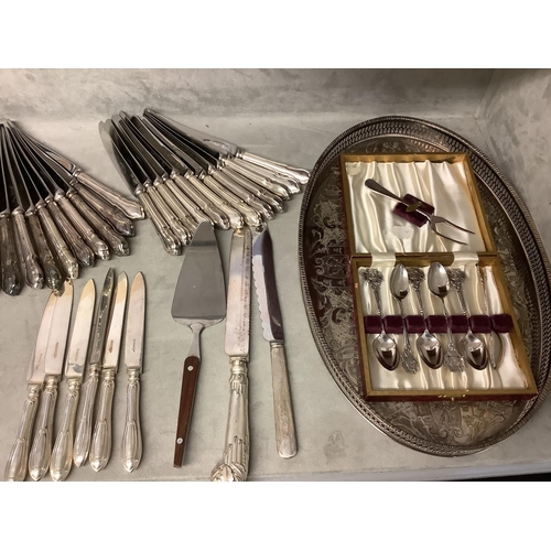 112 - Part electroplated flatware service and a plated galleried tray and a large easel backed frame